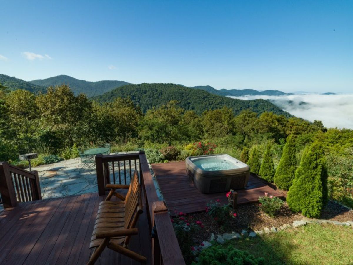 hot tub on deck background with view of mountains