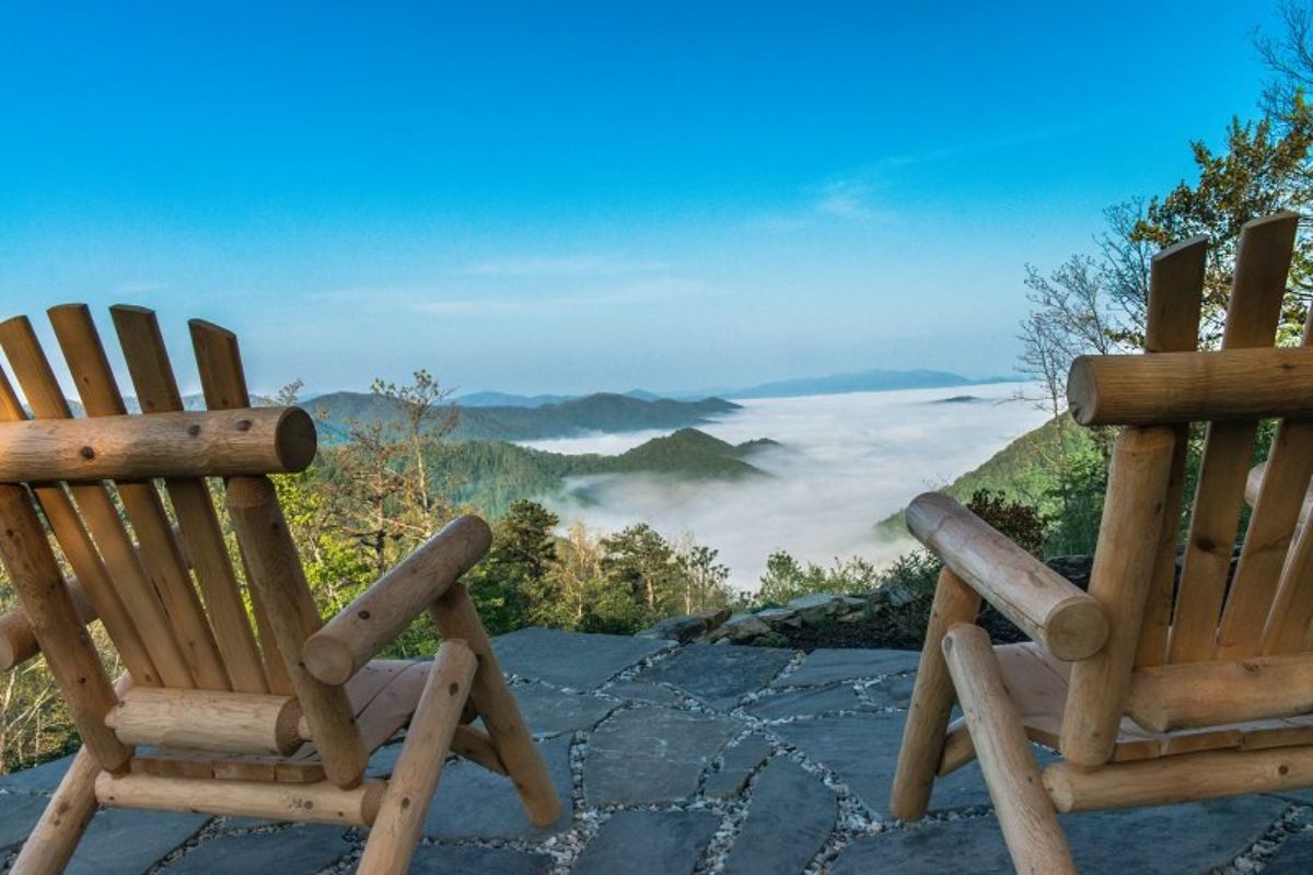 view down stairs to foggy valley of moutains