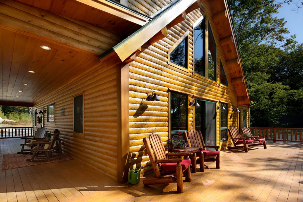 wood chair by great wall door on deck with red cushions