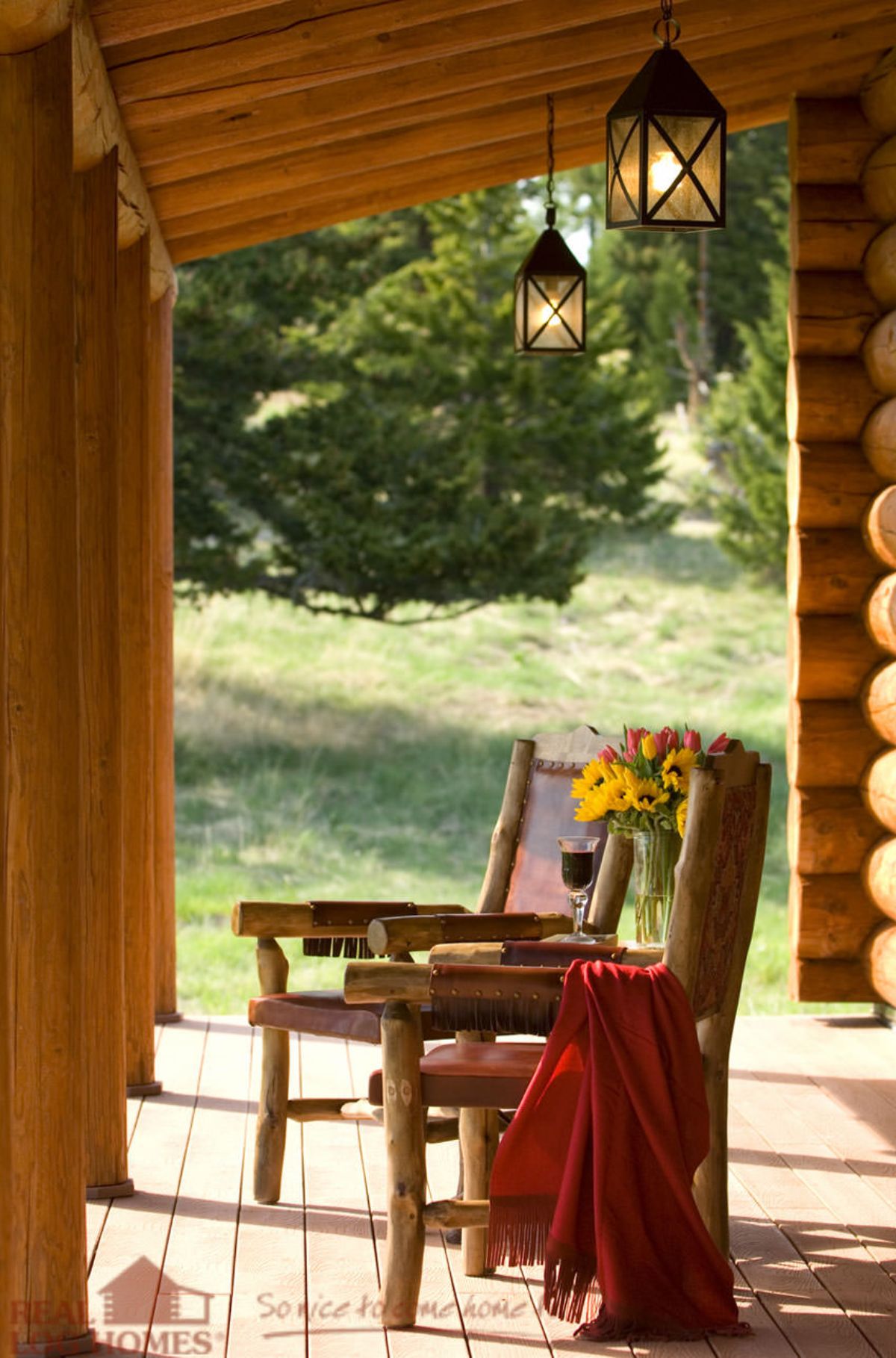 rocking chairs on log cabin front porch