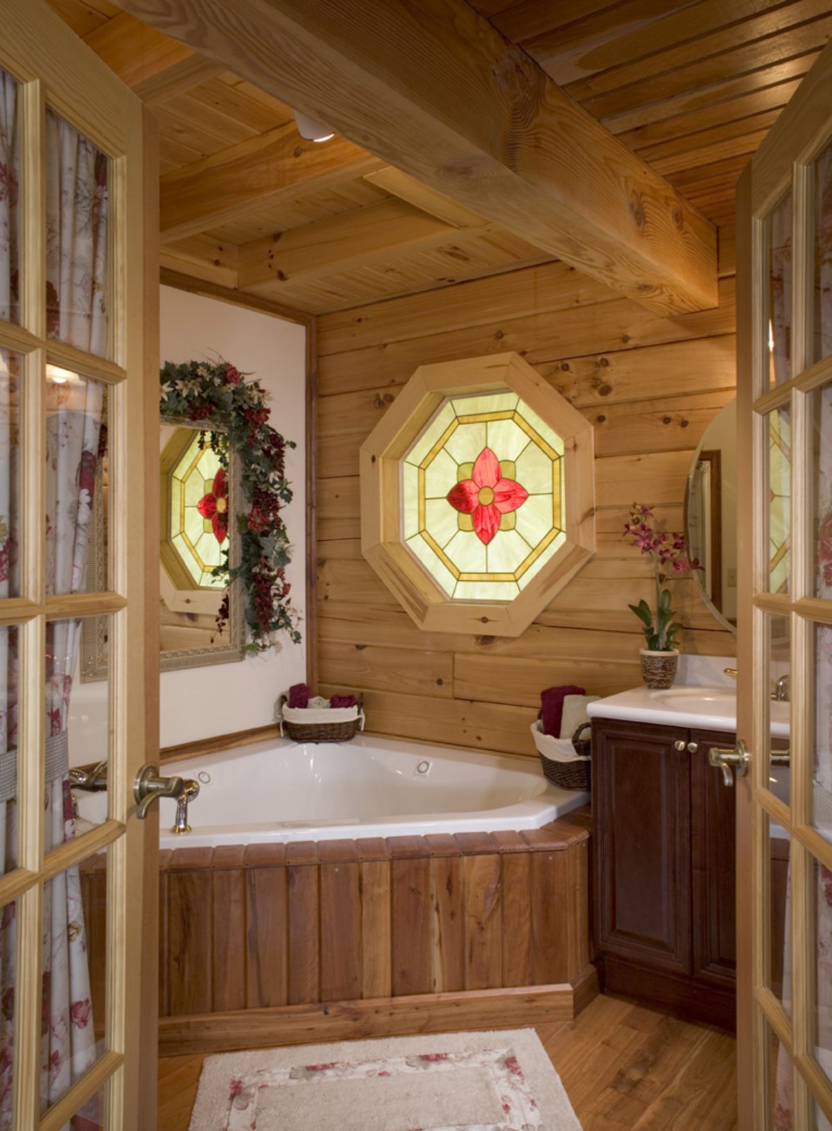 corner jacuzzi tub in log cabin bathroom