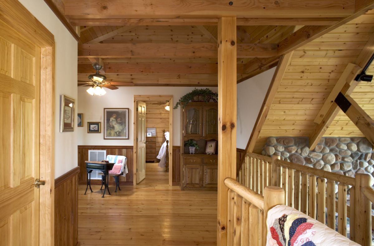 log cabin open room with table in background