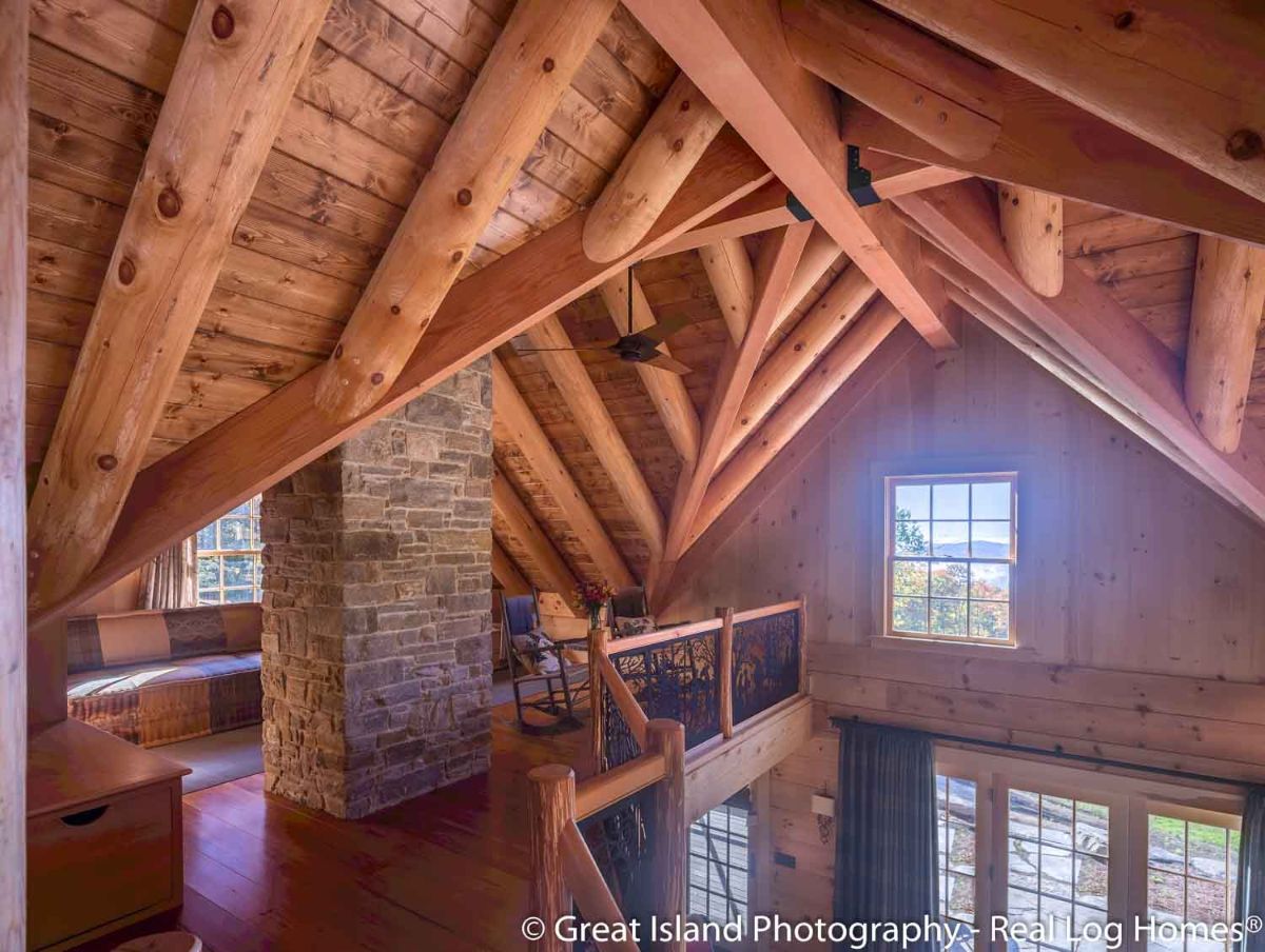 loft landing with wrought iron railing on sides