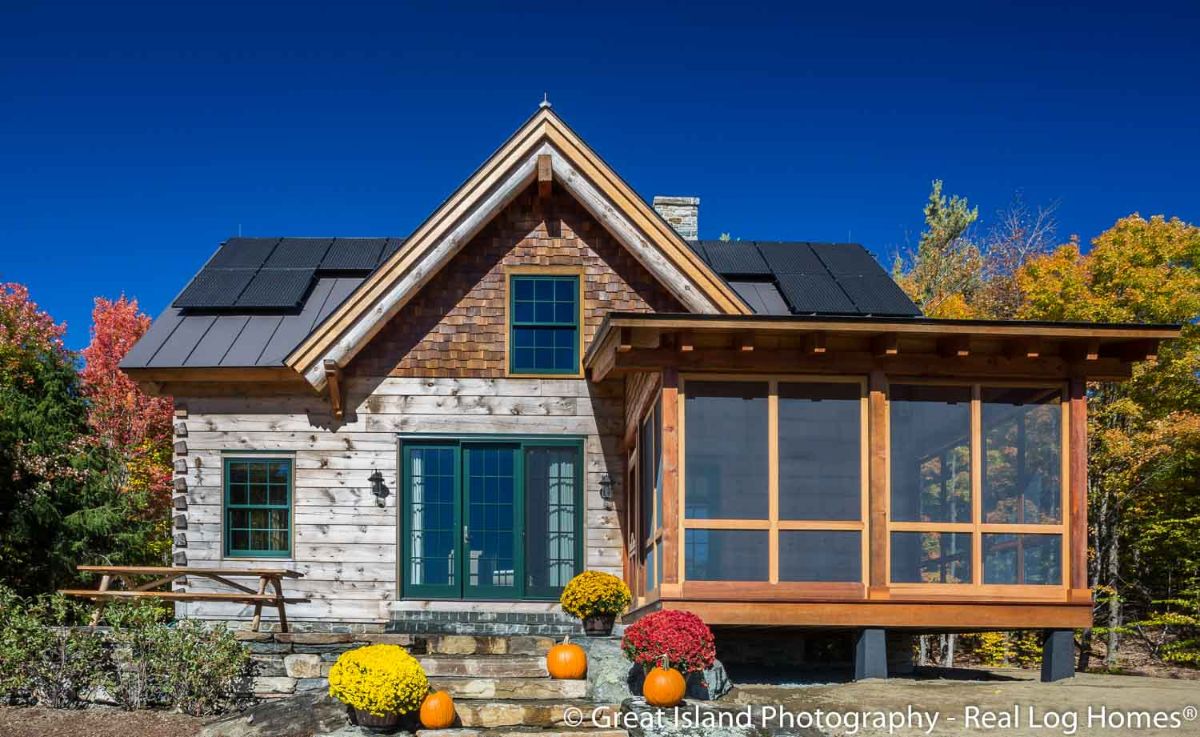 screened porch on front of log cabin