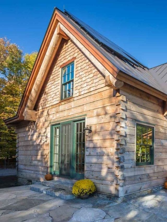 Vermont Log Cabin with Wrought Iron Details