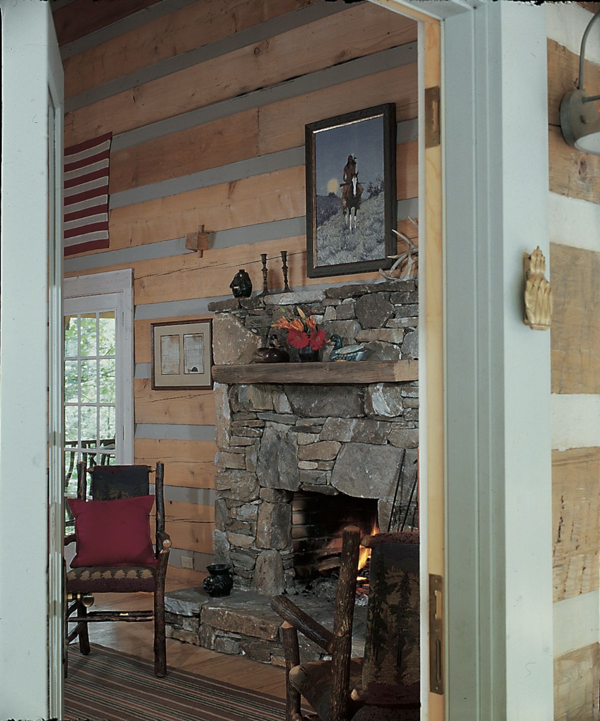 fireplace on right inside white door frame