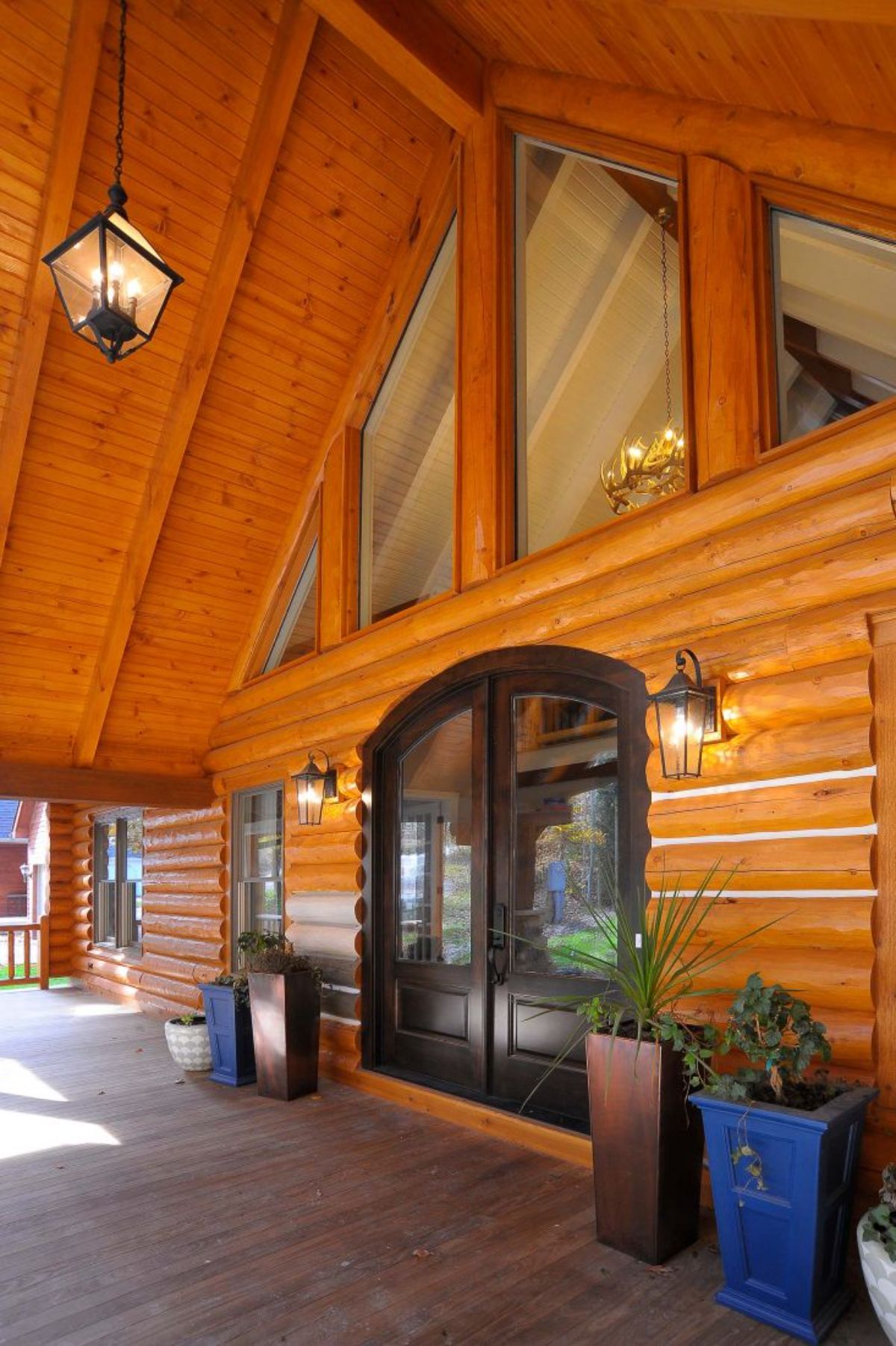 arched doorway leading into log cabin