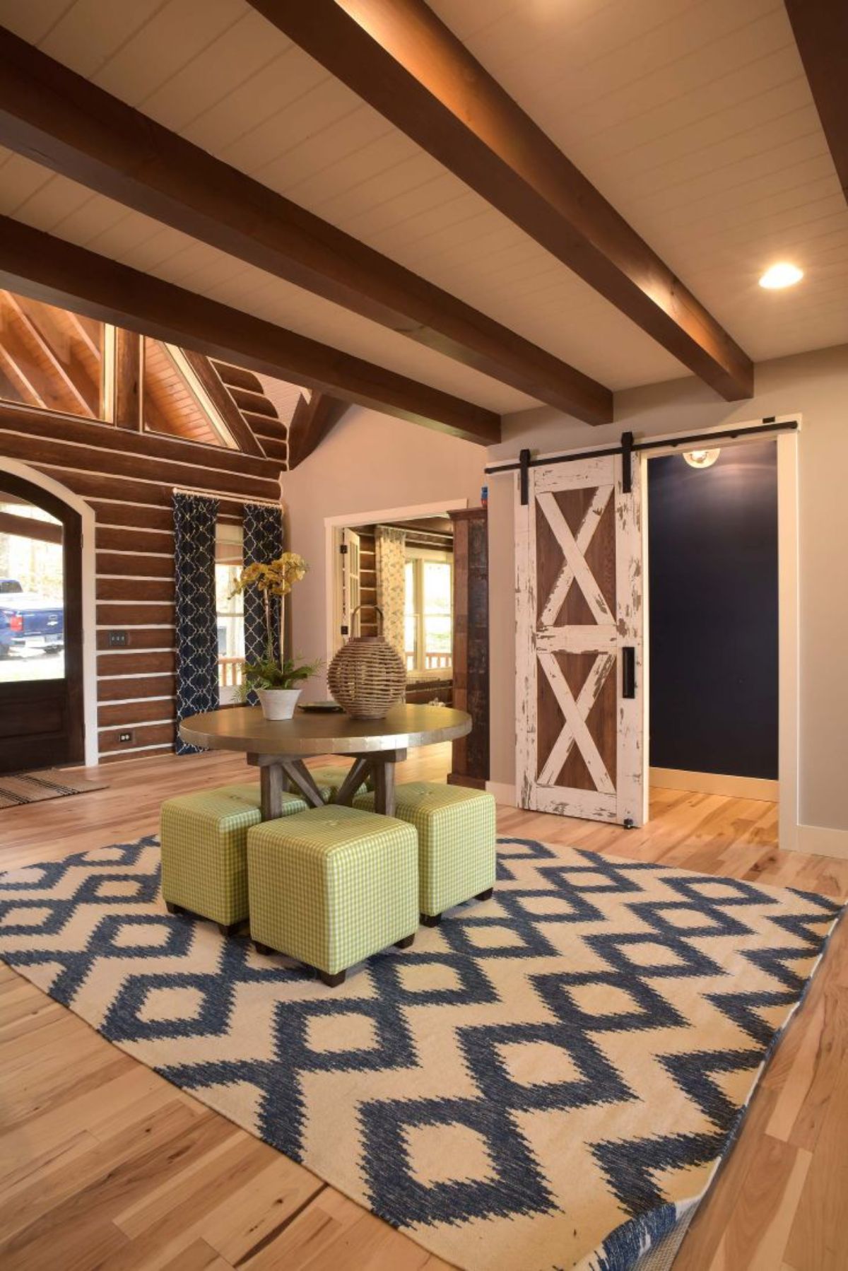 light green cubes on geometric pattern rug by door