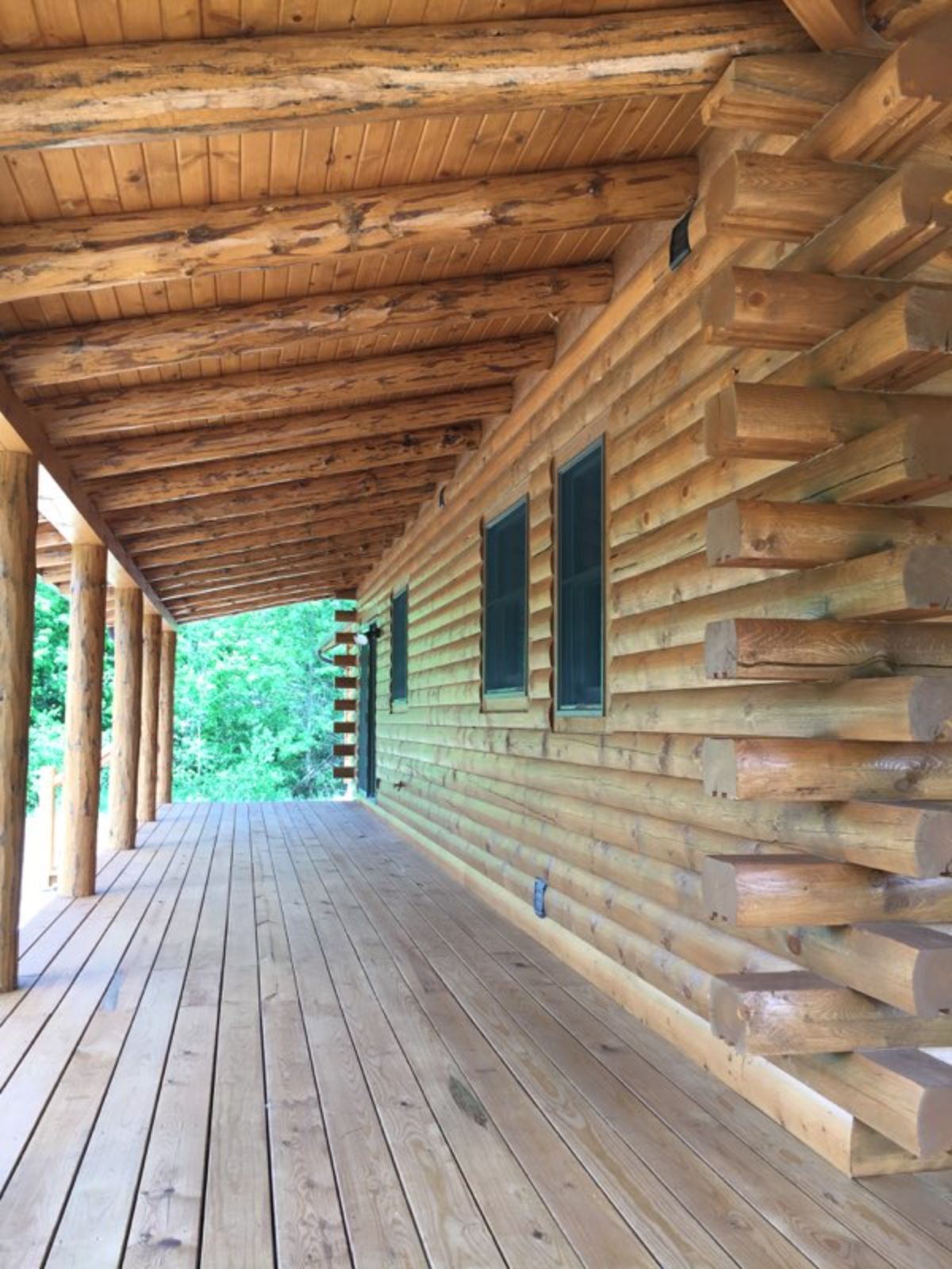 view across log cabin front porch