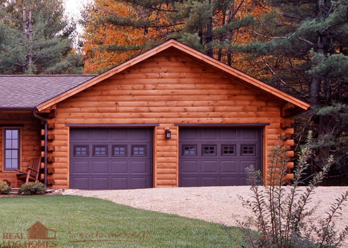 2 car garage on cabin with brown doors