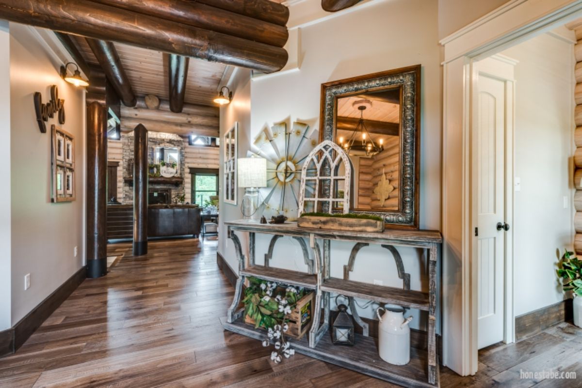 Table underneath mirror in entry way