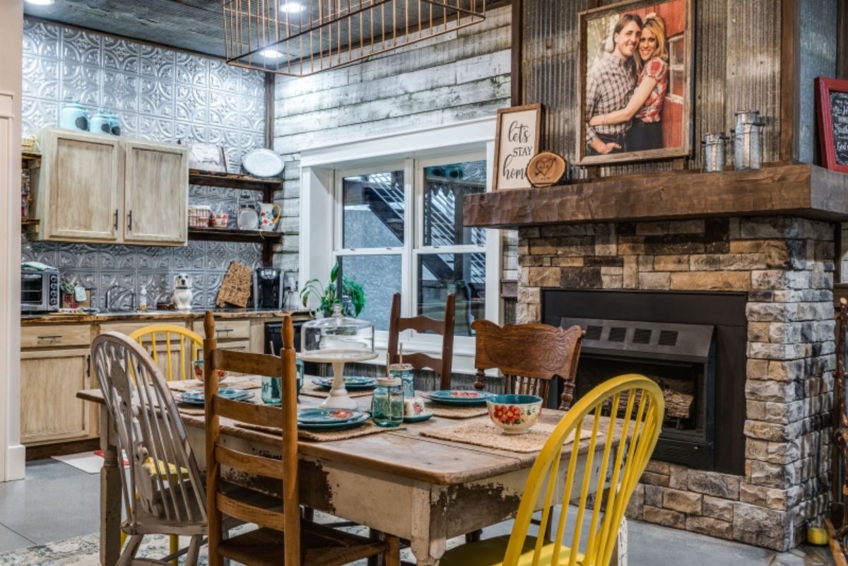 yellow chair at end of table in dining room