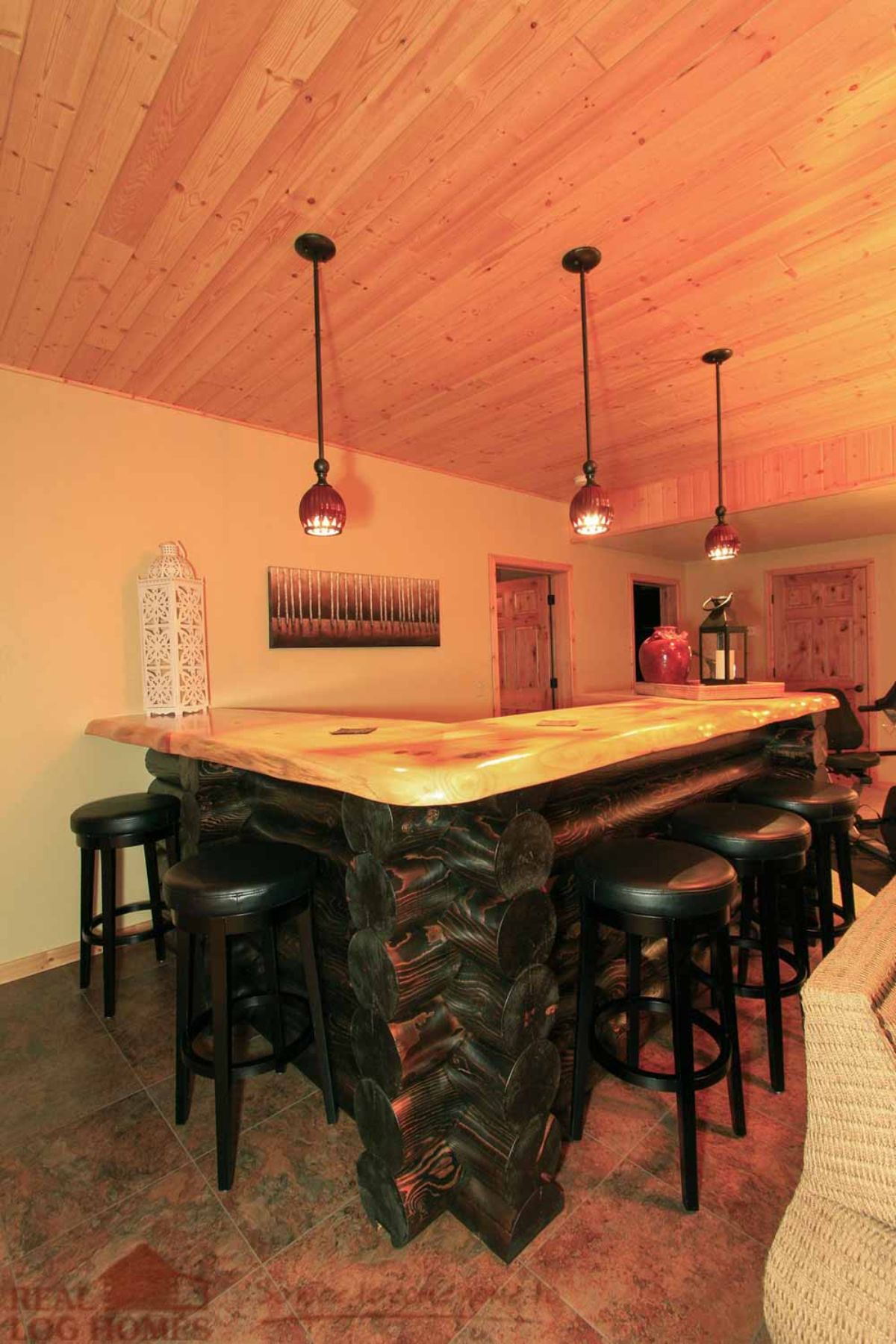 black marble exterior of island with light top in basement