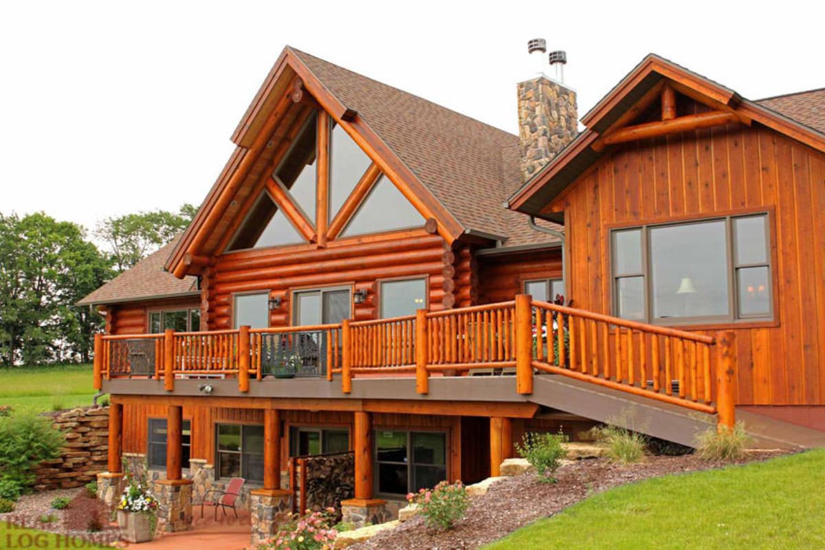 open deck on the back of log cabin