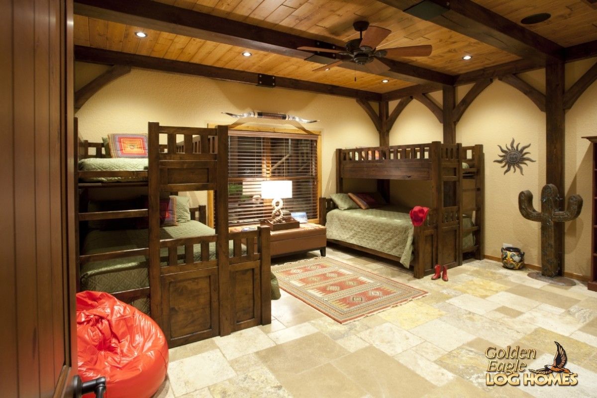 dark wood bunk beds in bedroom with red bean bag chair