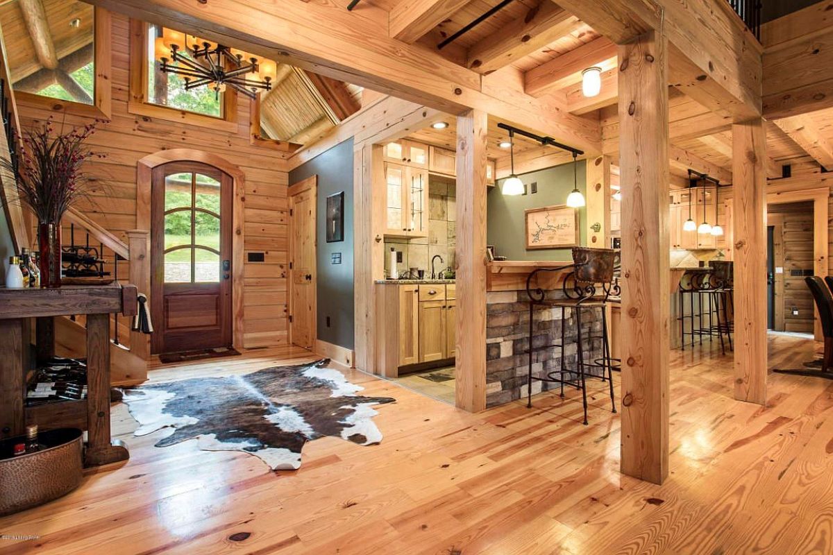 cowhide rug in front of door with glass panes