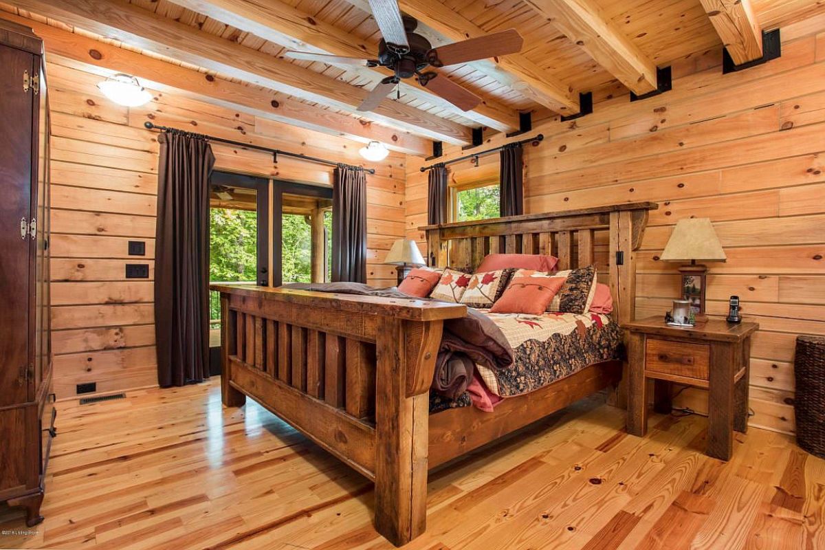 wood bed frame with window in background with gray curtains