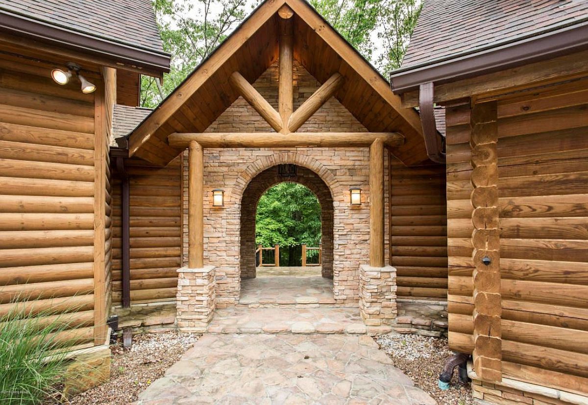 open breezeway between buildings with stone arch