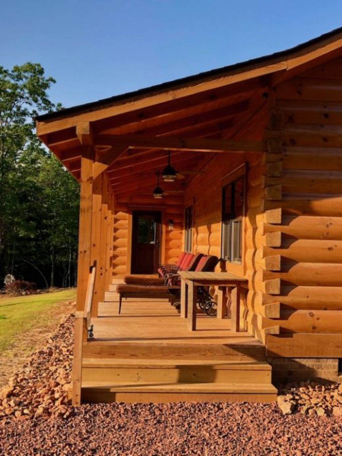 chair on porch on side of cabin