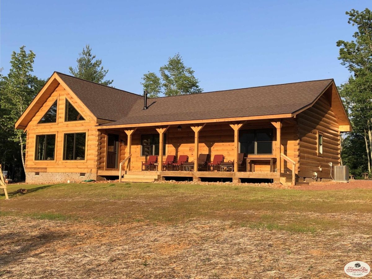 light wood cabin with great room trapezoid windows on left