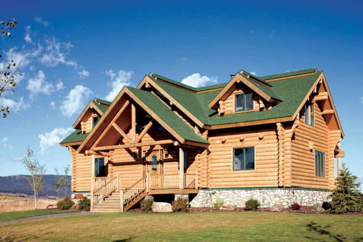 green roof on light wood cabin