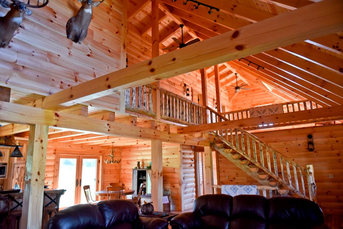 view up to loft from log cabin living room