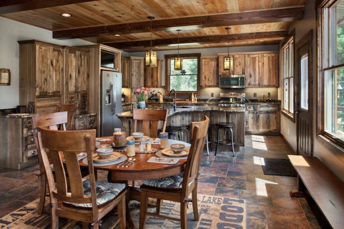 view across dining room into kitchen with stone bar