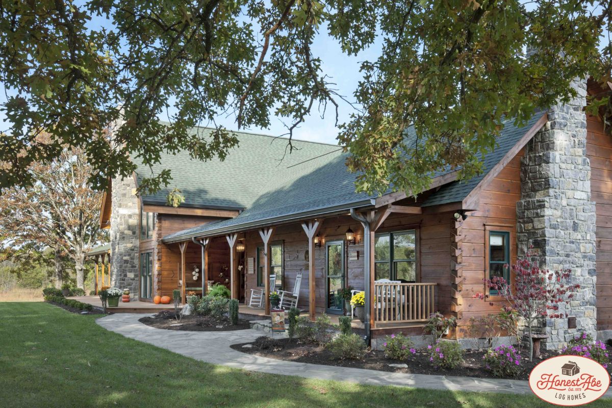 front of log cabin with covered porch