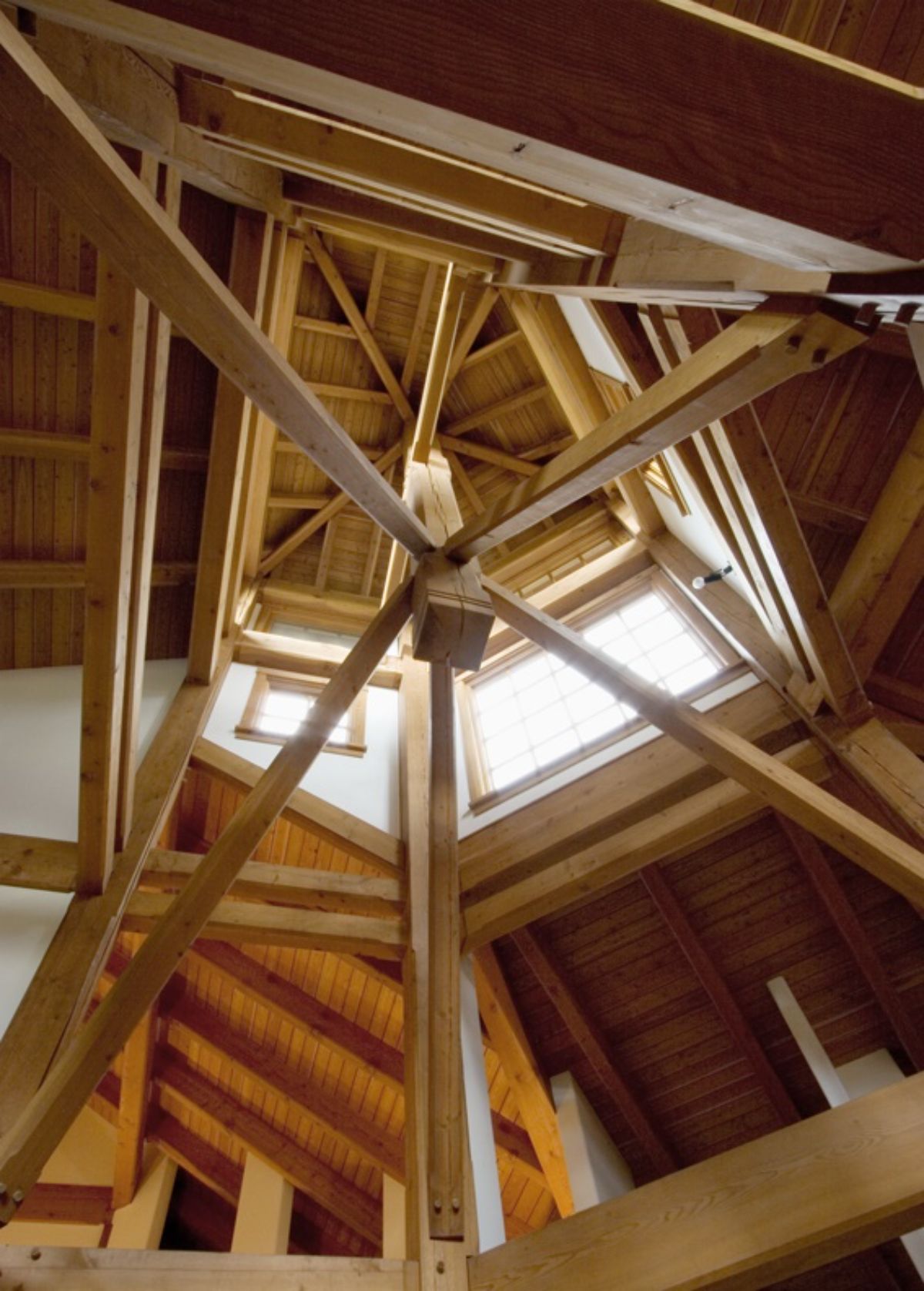 interior woodwork in log cabin showing open wood beams