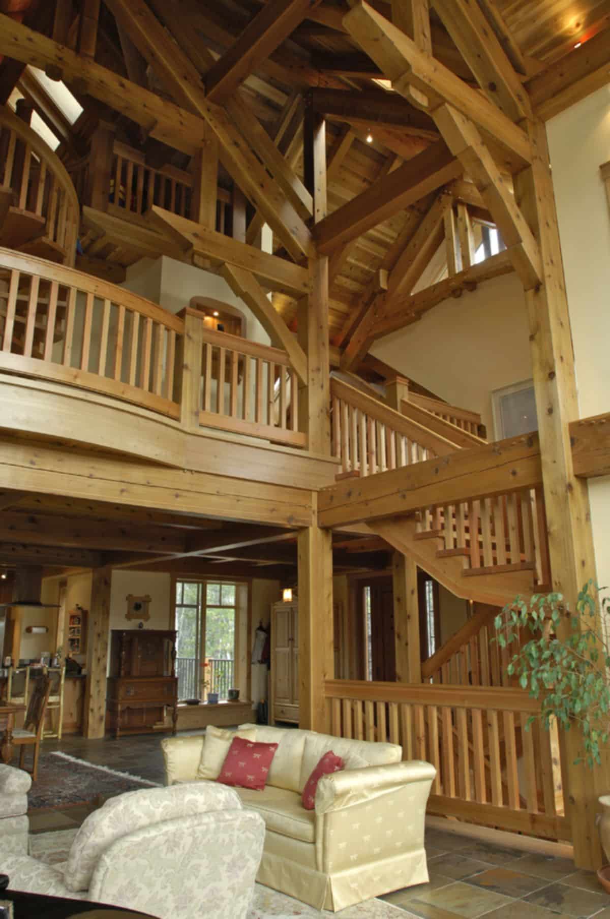 railing along upper loft landing and stairs from main floor in background on right