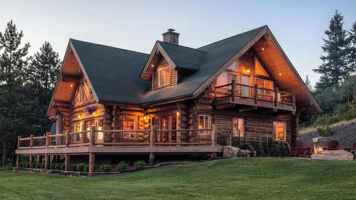 back of log cabin showing porches