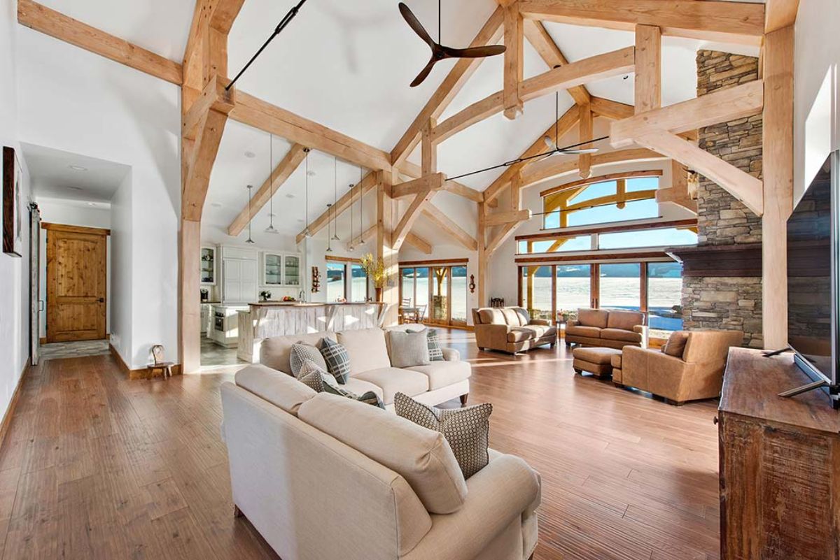 cream furniture under white ceiling with exposed beams