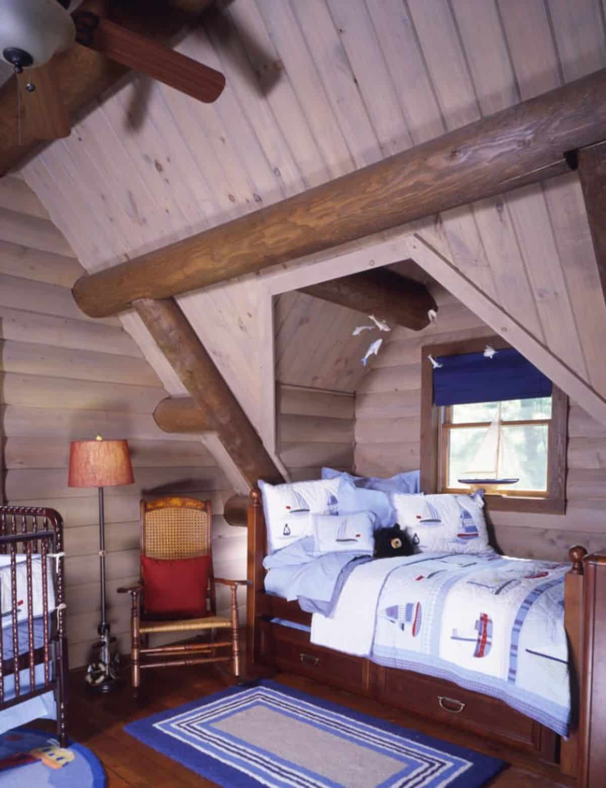 twin bed under dormer window with whtie bedding
