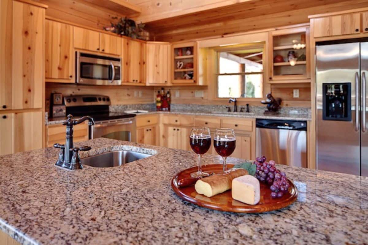 view across light granite counter on island in kitchen