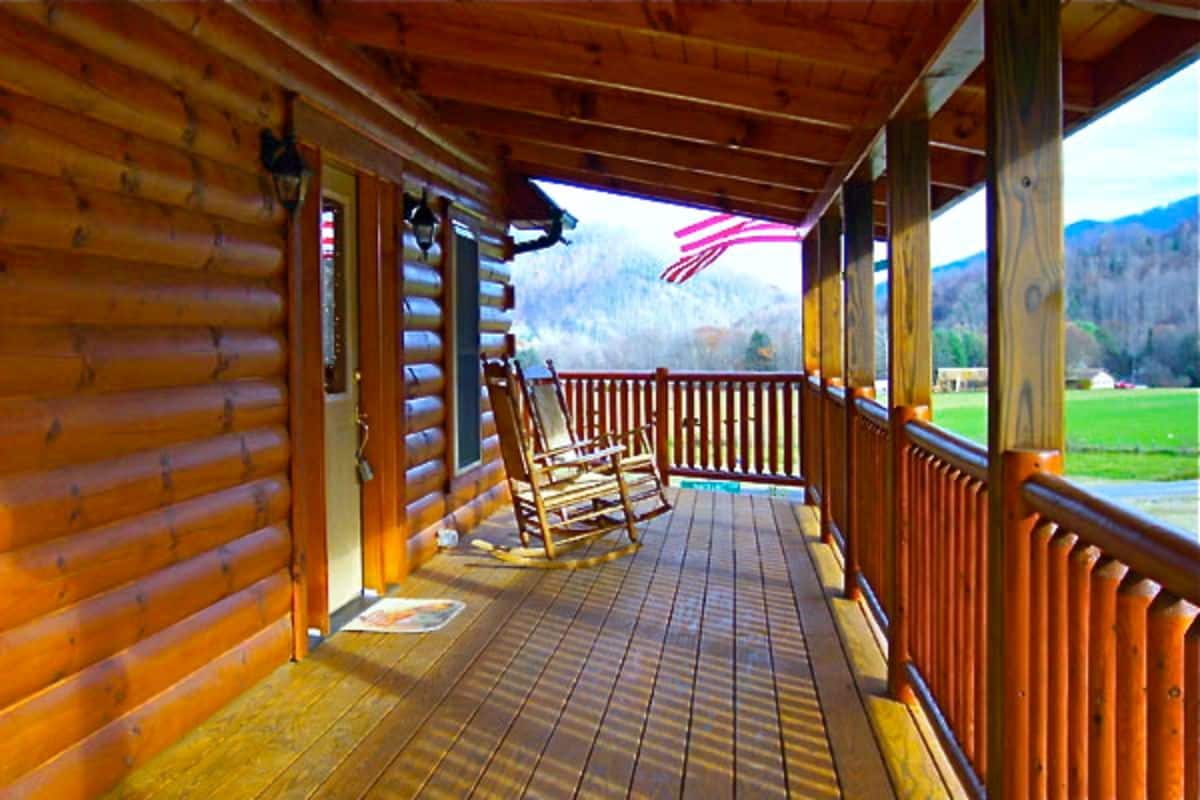 view across porch on log cabin