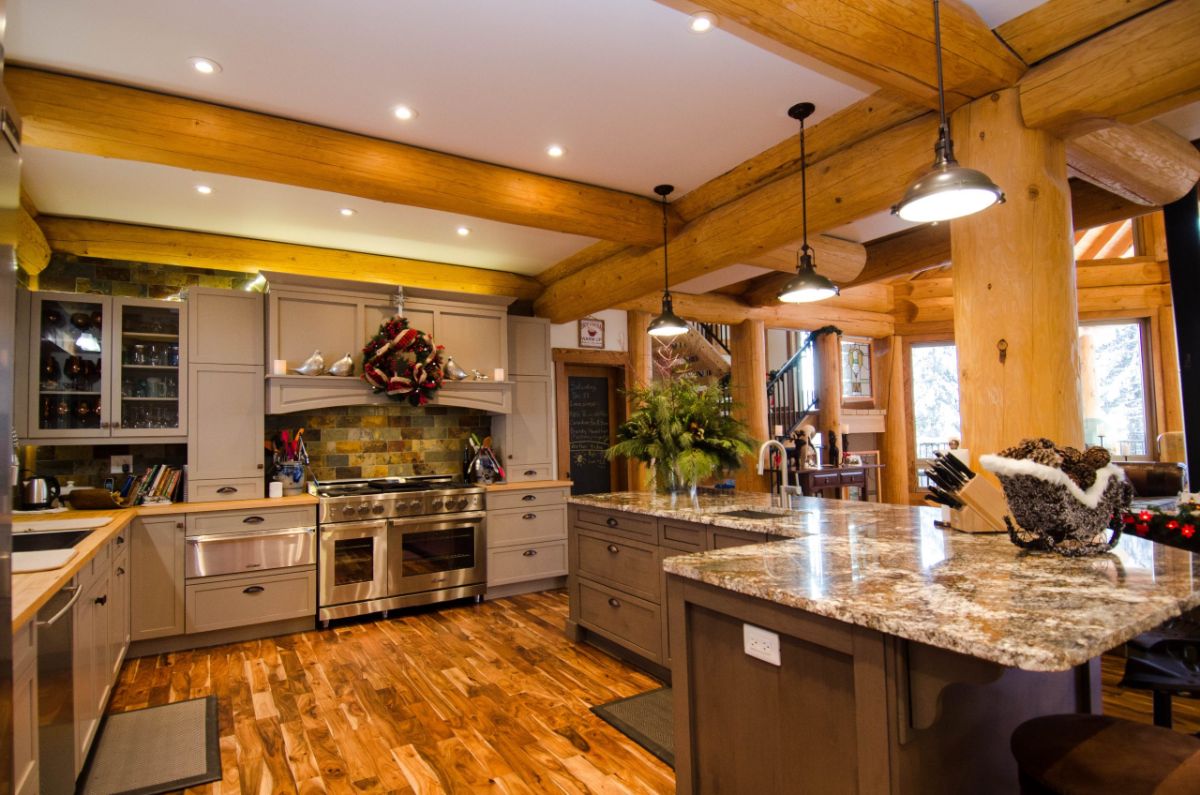 gray cabinets and stainless steel appliances in kitchen