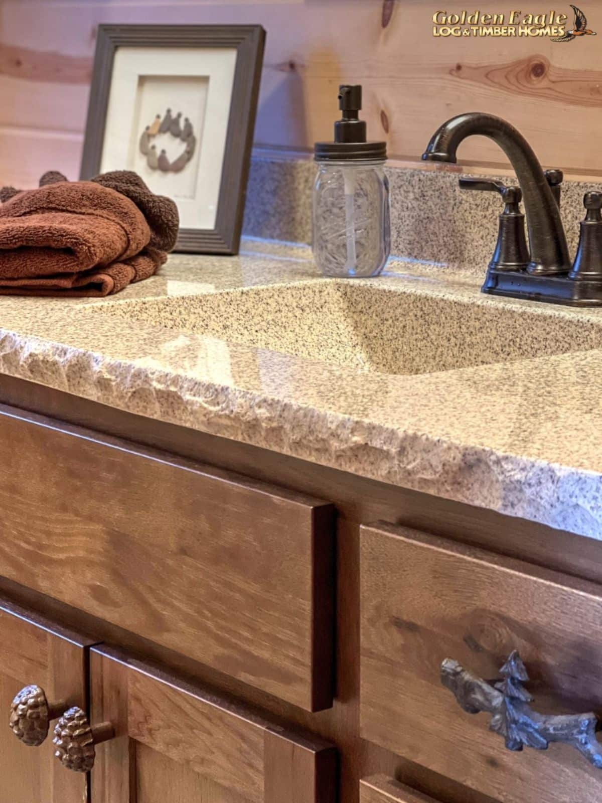 light countertop on sink with black faucet