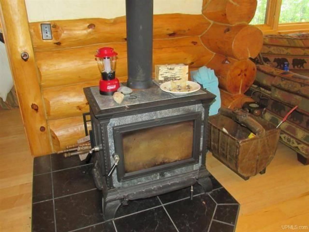 wood burning stove on black tile
