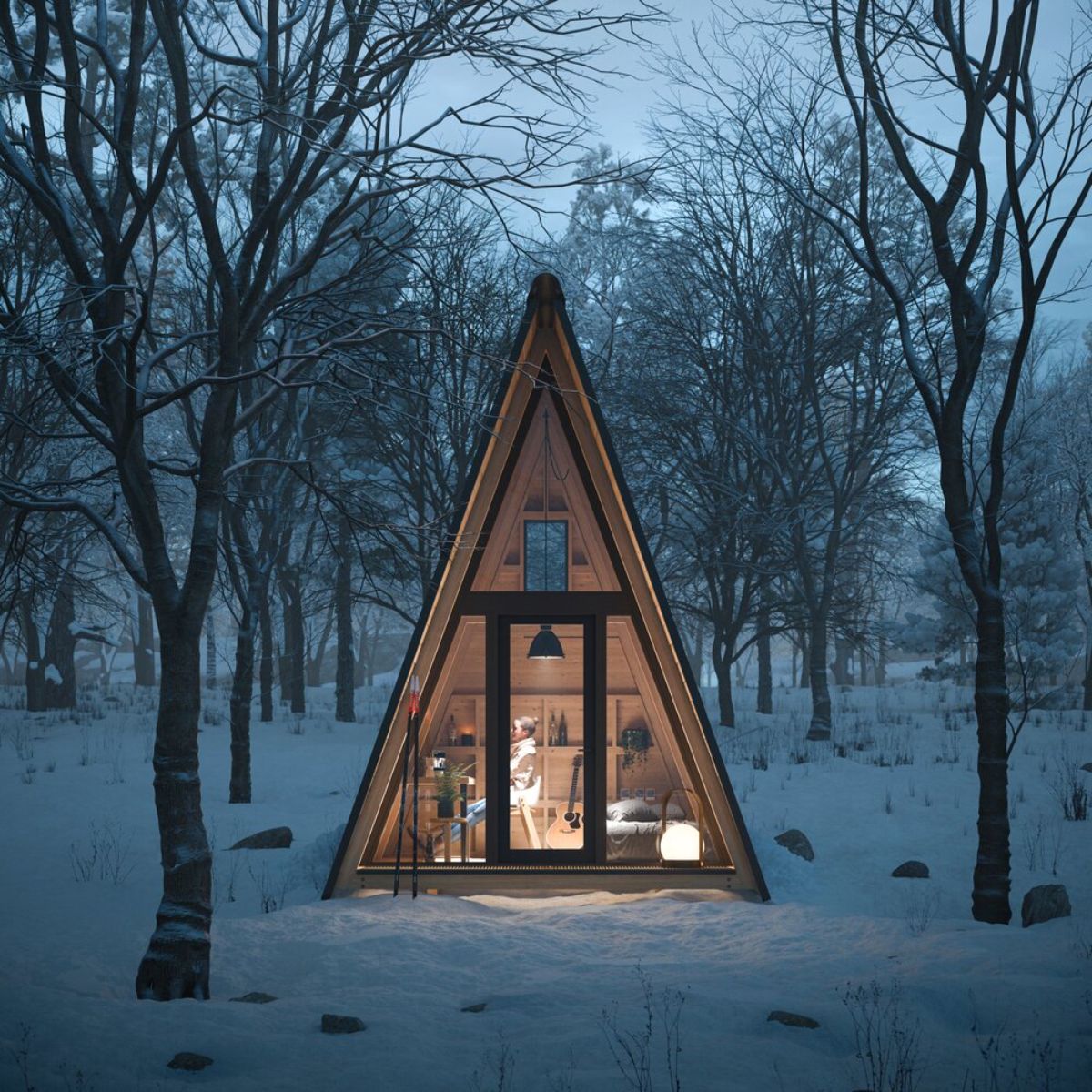 a-frame with lights on inside and snowy background