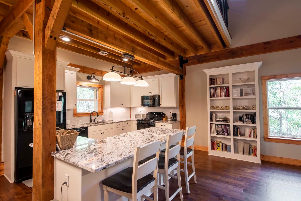 st island in kitchen with white cabinets