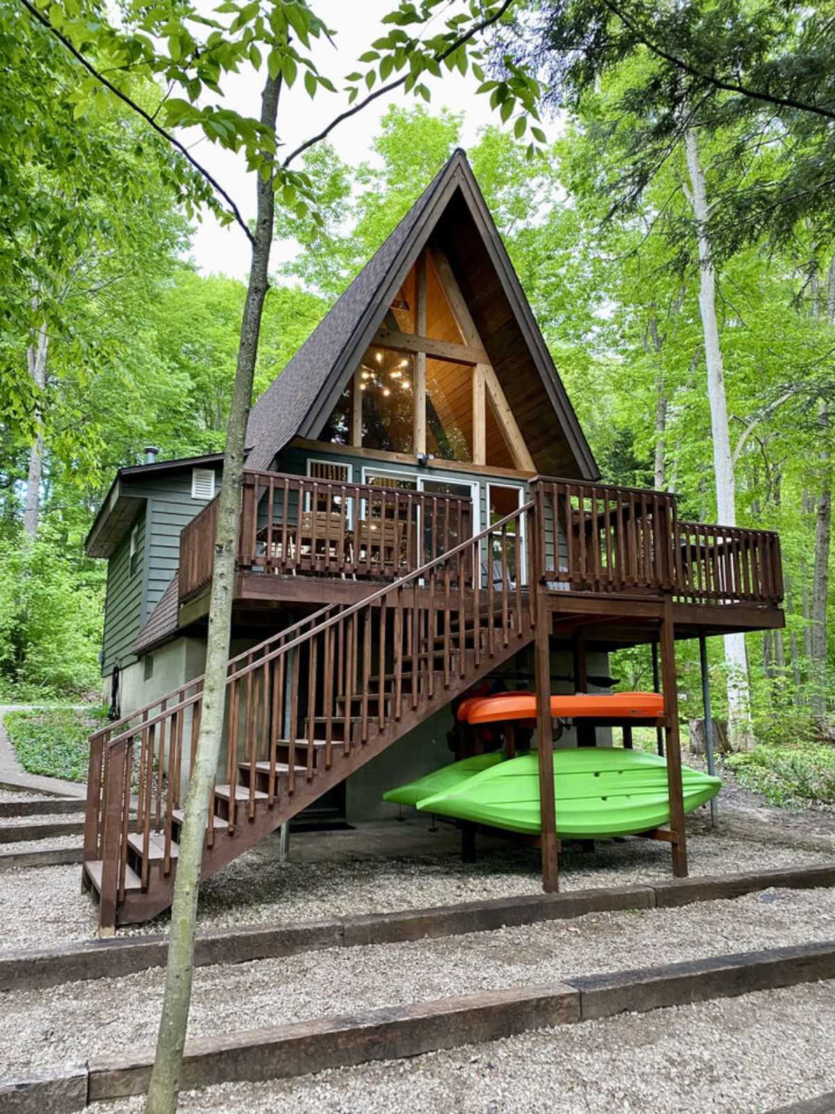 wood stairs leading to top level of a-frame deck