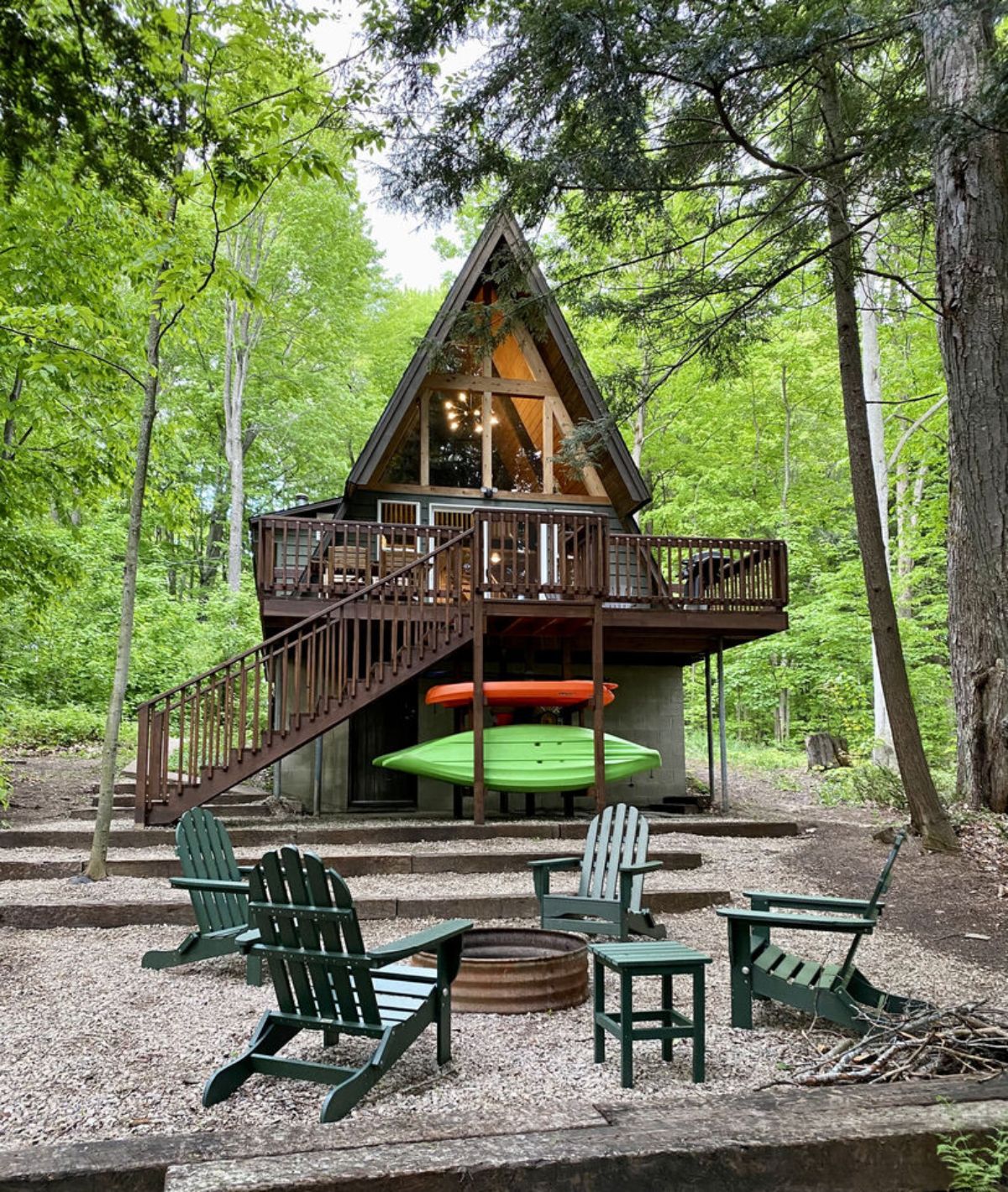 back of a-frame with fire pit in foreground