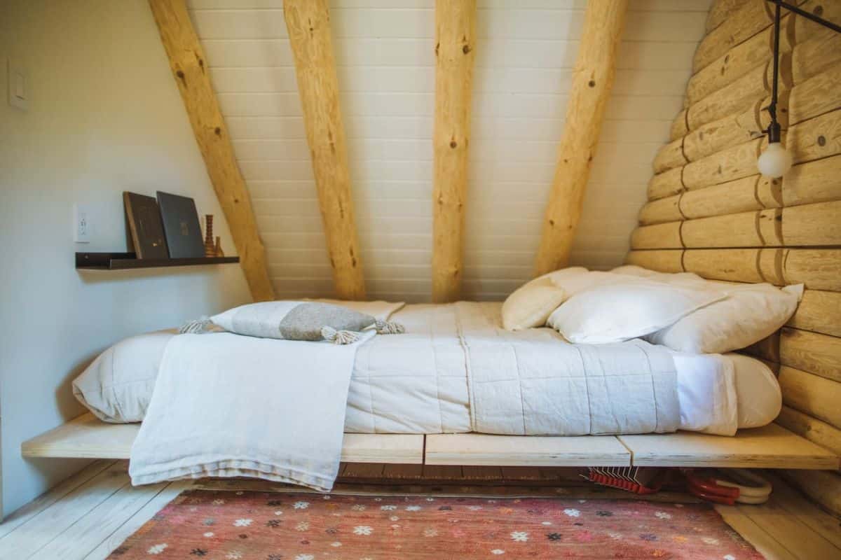 bed against roofline in loft