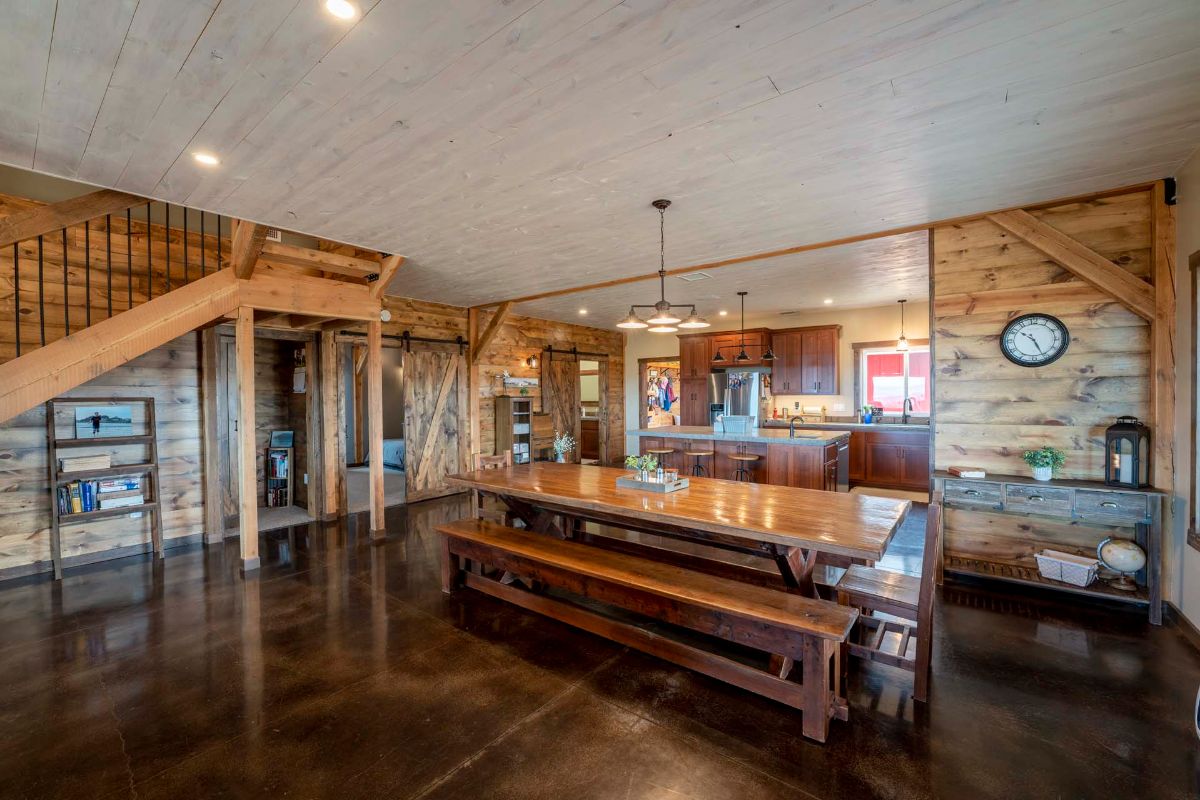 long wood bench table in front of kitchen