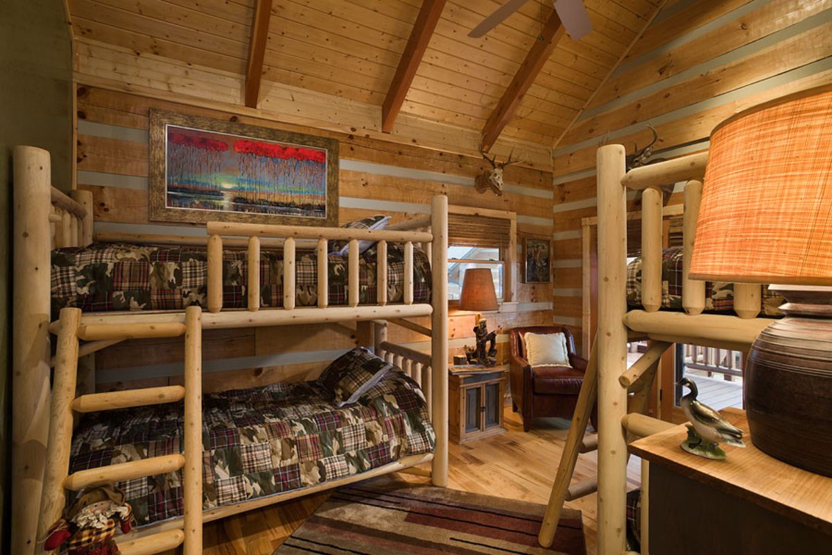 two sets of wood bunk beds in bedroom