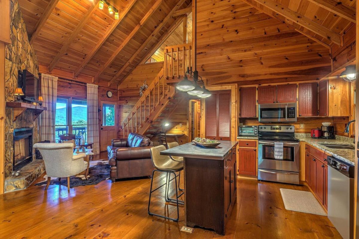 stainless steel appliances in kitchen with small island