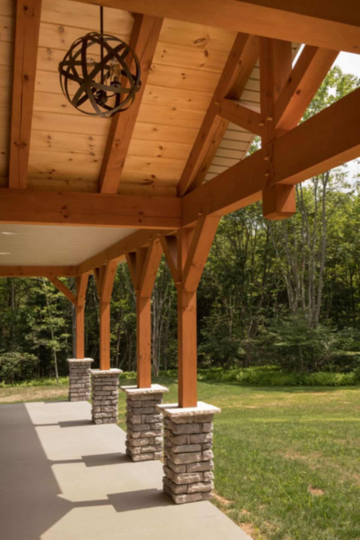 stone columns under porch roof