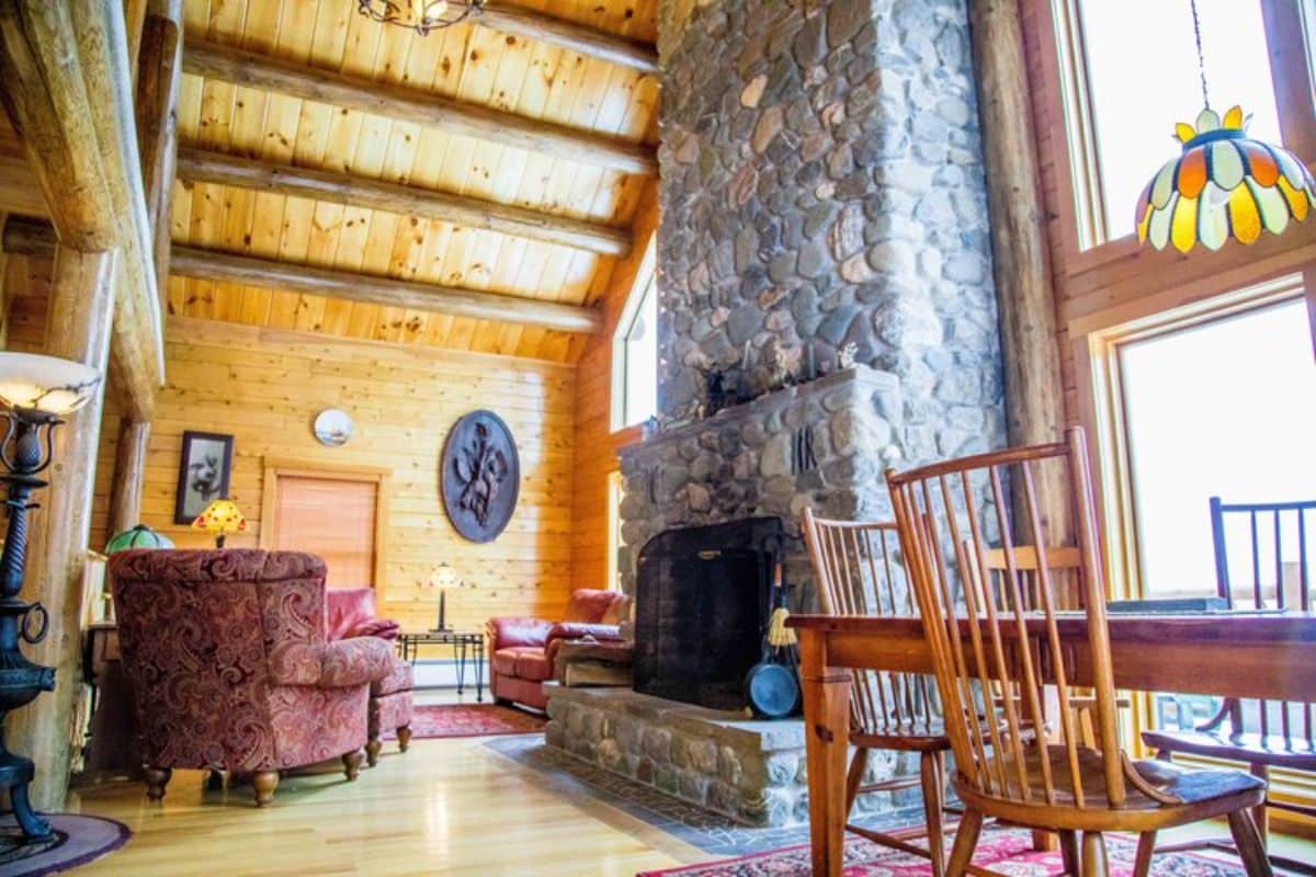 living room behind fireplace in cabin