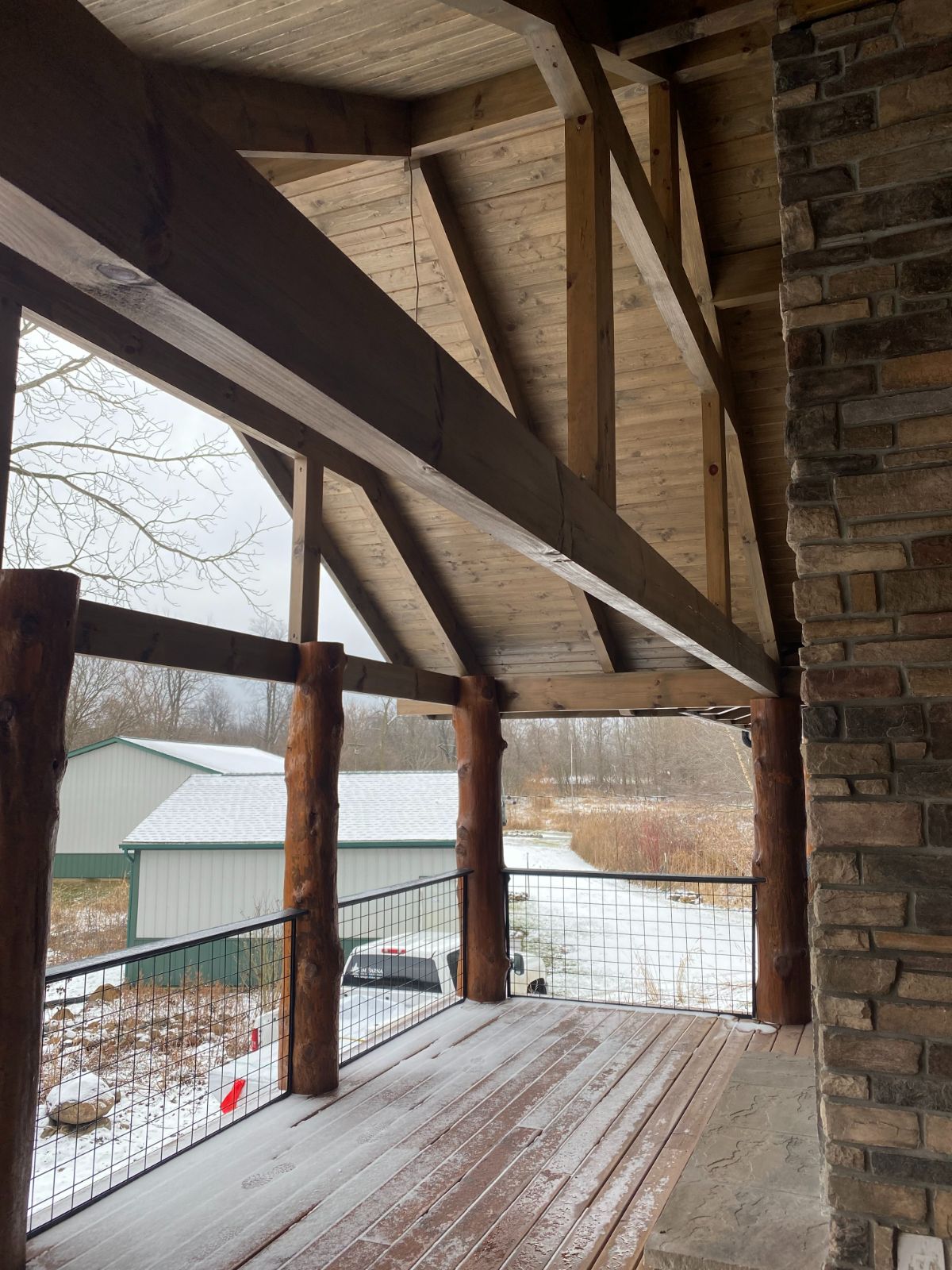open covered porch on back of cabin