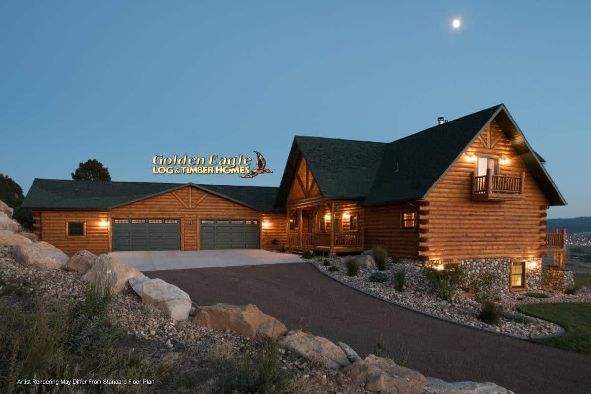 long driveway up to 2 car garage on log cabin